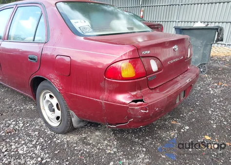 1999 Toyota Corolla Ve from USA, damaged, VIN 2T1BR12E9XC217768